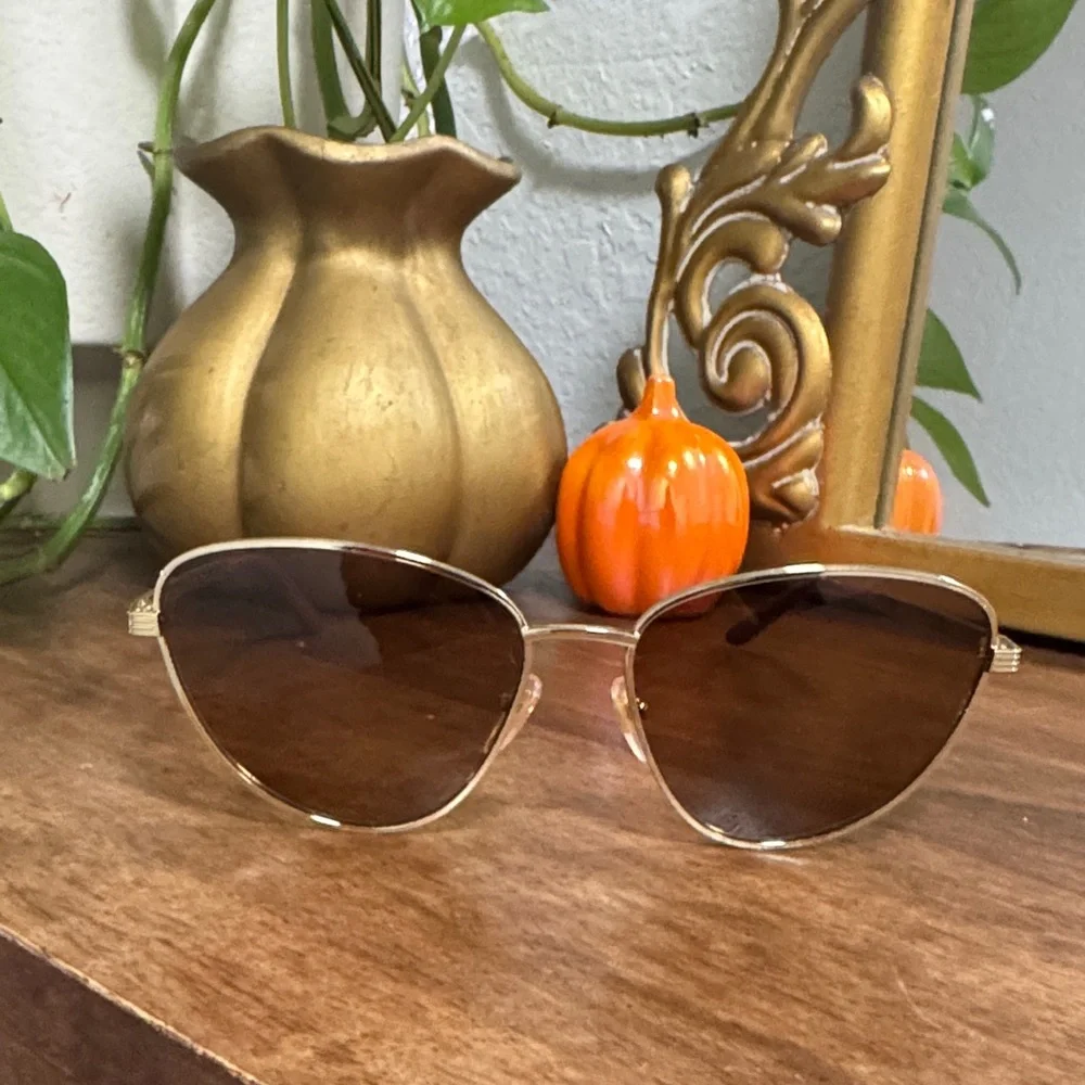 Gucci Gold Cat-Eye Sunglasses